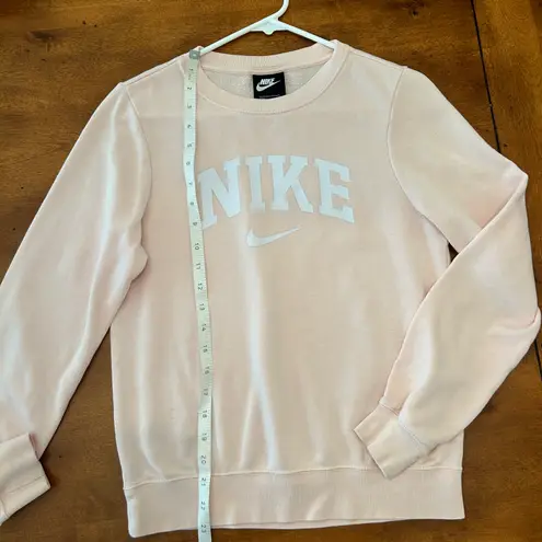 Nike women’s pink sweatshirt, size XS