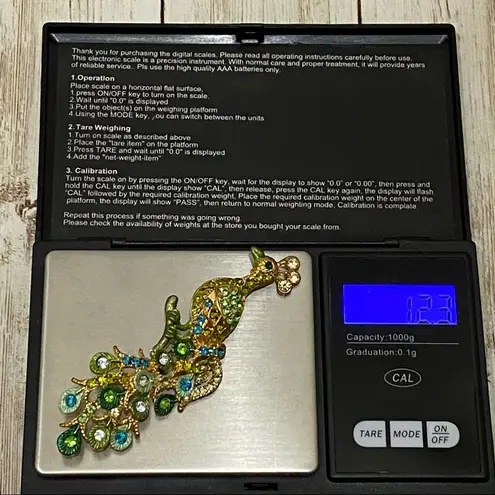 Unsigned Green Rhinestones Peacock Brooch