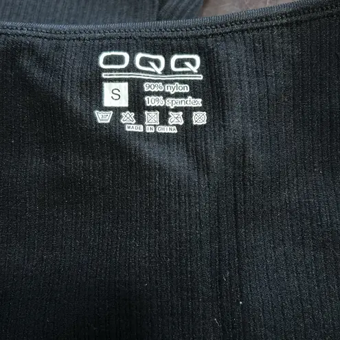 OQQ Woman’s yoga jumpsuit black ribbed bell bottoms Size Small