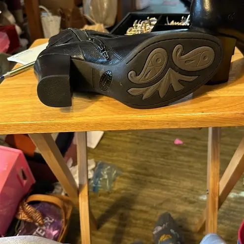 Black Born midcalf boots. They are in excellent condition. The soles are clean Size 11