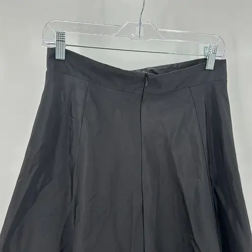 Onyx Nite Onyx a-line black light sheen lil bit of tulle under back zip skirt size M
