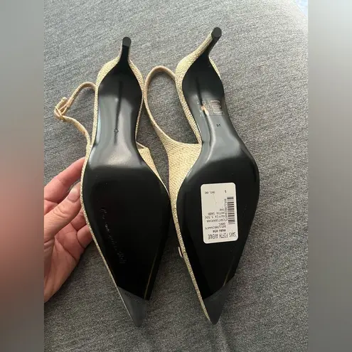 Dolce & Gabbana
Logo-embellished raffia slingback pumps