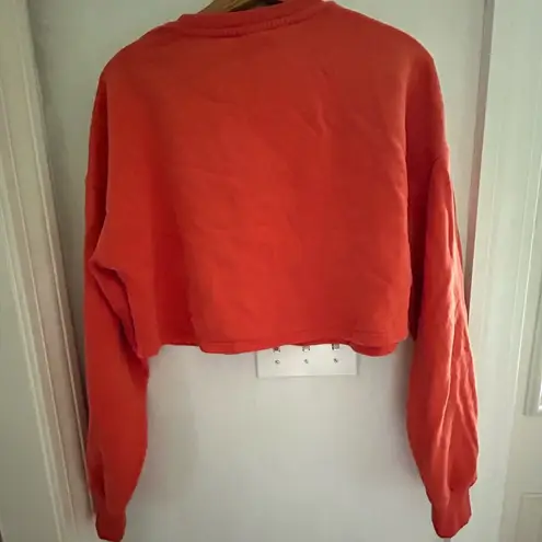 women's best Women’s Best size large orange cropped sweatshirt.