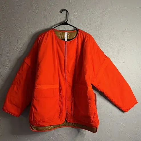 Lululemon  Insulated convertible jacket size L in solar orange