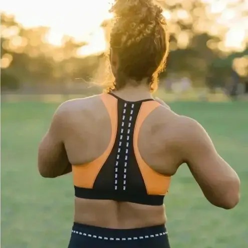 Zyia NWT  Orange on Black Game Day Light n Tight Bra Sz XS