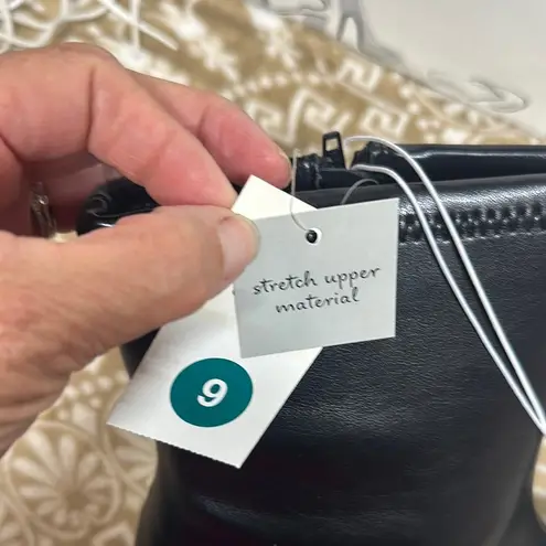 A New Day  Black Ankle Boots with Sleek Design