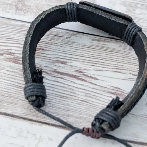 Leather? Tie Bracelet with Celtic Like Charm Black