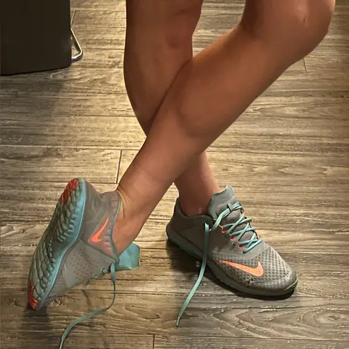 Nike Used, Thoroughly Worn:  Teal, Gray and Coral Running Sneaker