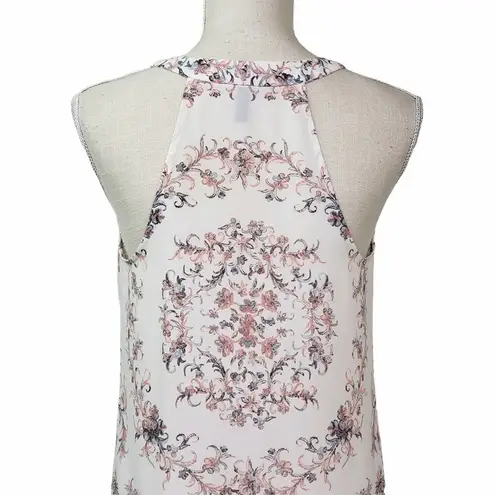 BCBGMAXAZRIA  Handkerchief Hem Floral Blouse Runs Large - Image 5