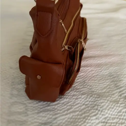 Brown Leather Shoulder Bag with Slouchy Design and Gold Hardware