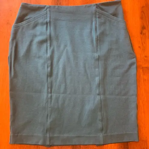 CAbi  skirt women’s 6 stretchy pencil skirt with zip.  Teal/turquoise mini