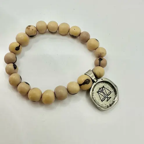 acai seed libra charm bracelet