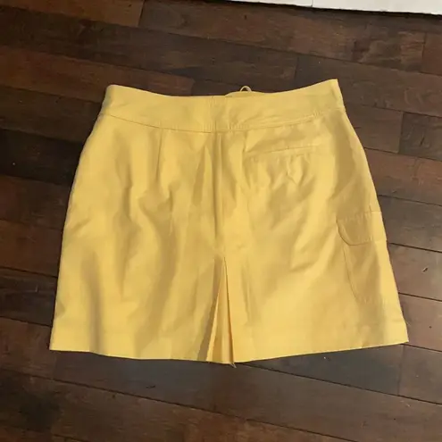 IZOD  golf skirt with inner shorts, yellow. Women’s size 12