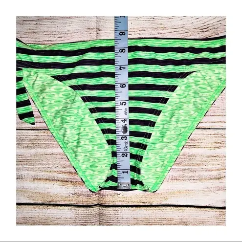 Oakley Green and Black Reversible swim bottom Size M/L