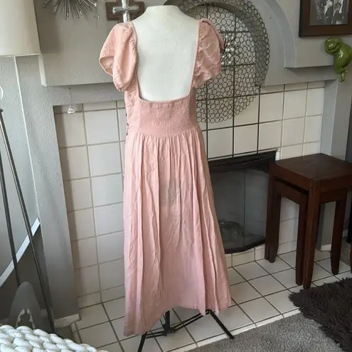 Free People  cut out waist backless w/ wrap top small in a pinky peach color
