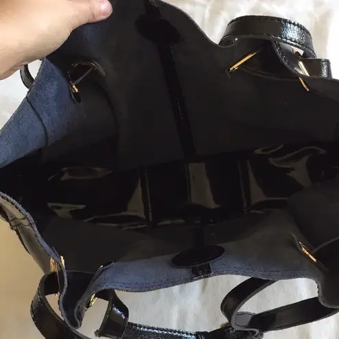 Black patent handbag