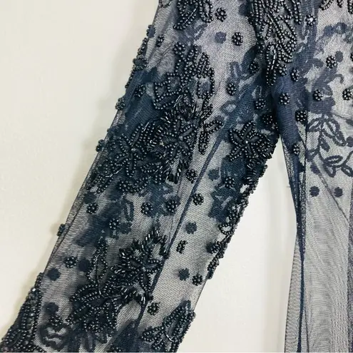 Naeem Khan’s vintage 90s Riazee Boutique floral beaded black cocktail dress. 4