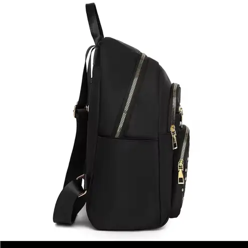 Elegant Black Quilted Backpack