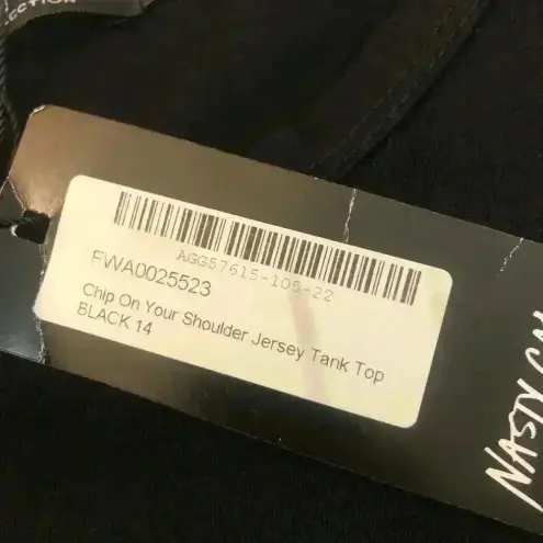 Nasty Gal  chip on your shoulder black Jersey top sz 10 NWT