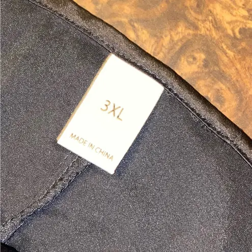 Black stretch satin, deep cowl neck slip dress with adjustable straps