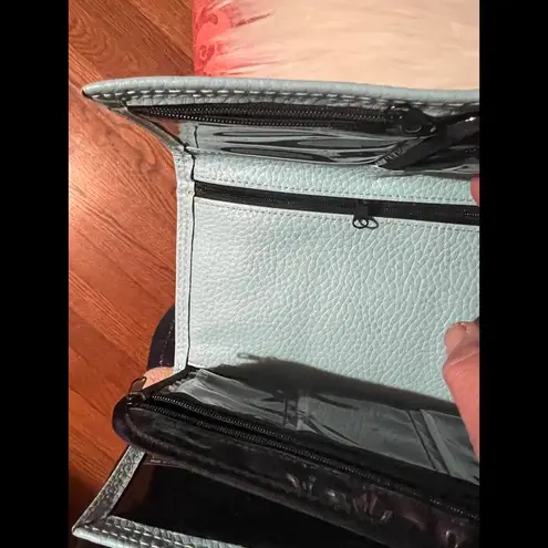 Stylish Light Blue Wallet with Ring Closure