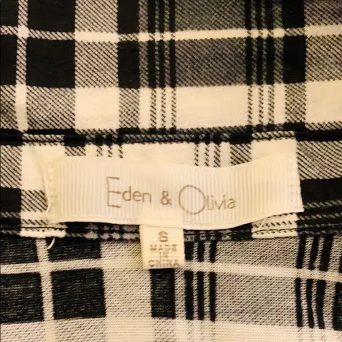 Eden & Olivia black, white & gray plaid shirt.