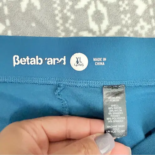 Betabrand  Yoga Riding Pants Dress Pants Snap Ankle Zip Pockets Teal Size XL Long