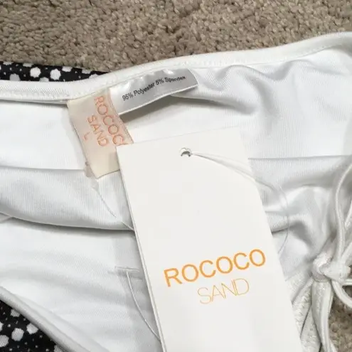 ROCOCO SAND side tie bikini bottoms. NWT Black Size L