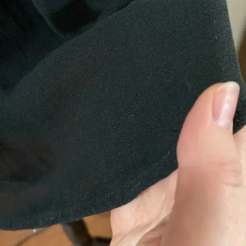 Free People  black Ruffle me up ruffled smocked detail front tie top size S