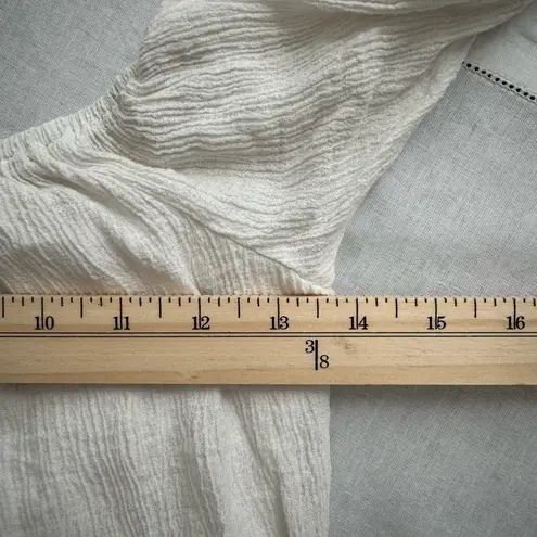 white size XS ruffled long sleeve dress with puff sleeves