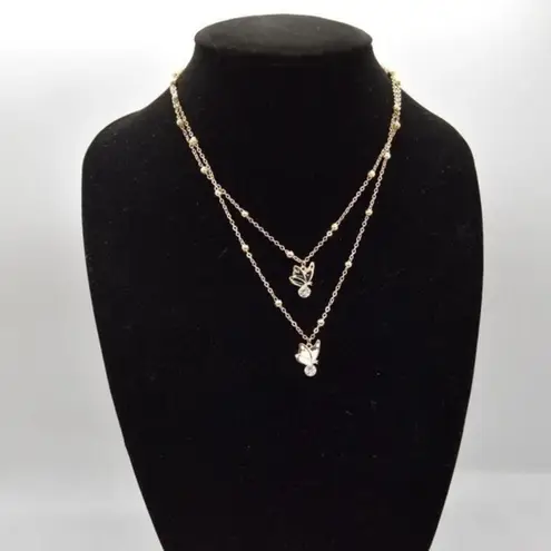 Set of Black and White Rhinestone Butterfly Necklaces Gold
