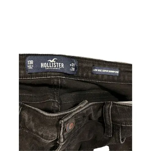 Hollister  distressed mid rise super skinny jeans size 31x26