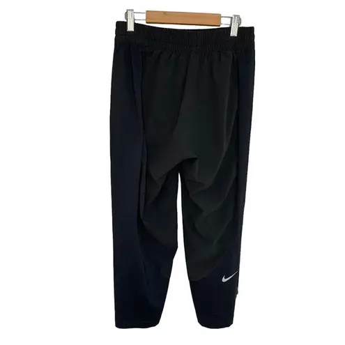 Nike  Shield Pants Womens Medium Running Slim Fit Stretch Jogger Black Pockets