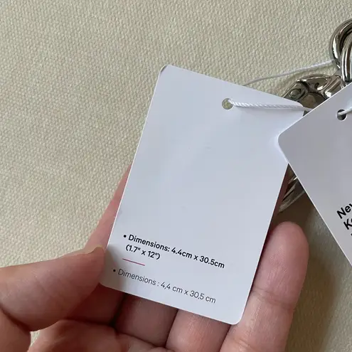 Lululemon Never Lost Keychain - Grey Sage/White Opal