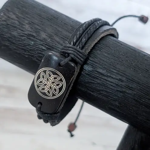 Leather? Tie Bracelet with Celtic Like Charm Black