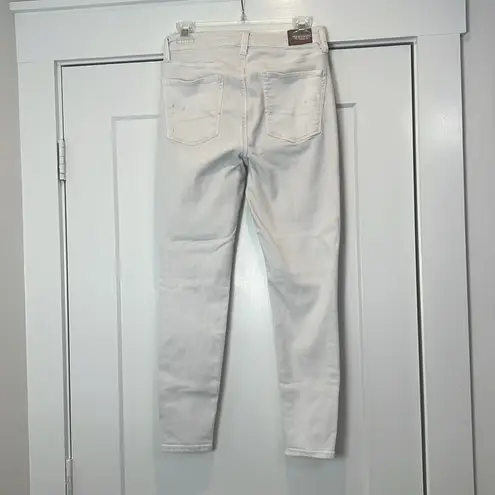 American Eagle  White distressed super hi rise jegging  Jeans size 8 regular.