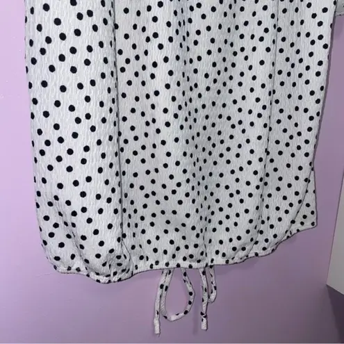 Lavish white top with black polka dots and cold shoulder neckline Size L