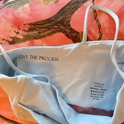 live the process orion sports bra in light sky blue