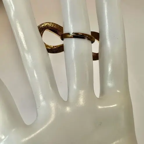 Pink and gold tone infinity ring