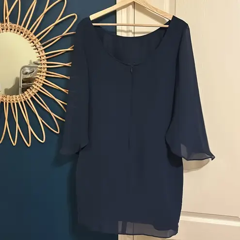 Jennifer Lopez navy mini dress with long sheer cape sleeves