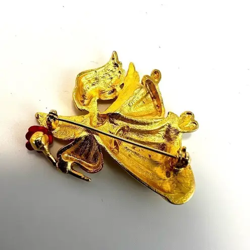 Tara vintage gold tone angel brooch with a rose pin