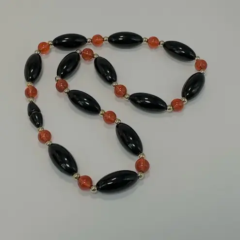 Black orange and gold tone vintage beaded necklace