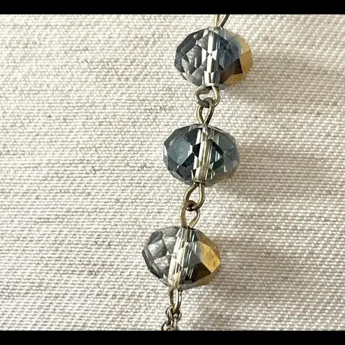 Long silver tone crystal necklace