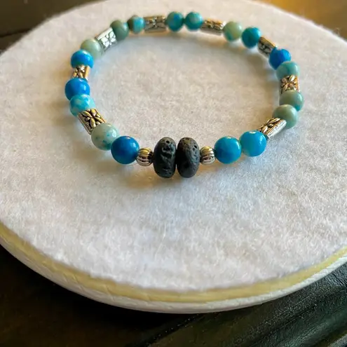 Fun handmade stretch blue beaded bracelet silver separaters lava beads