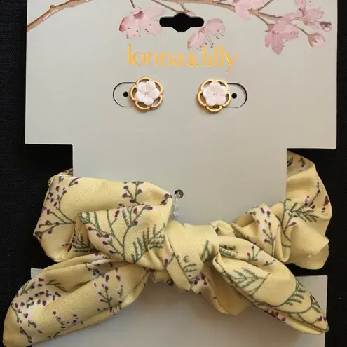 Pink flower stud earrings with matching yellow hair scrunchie