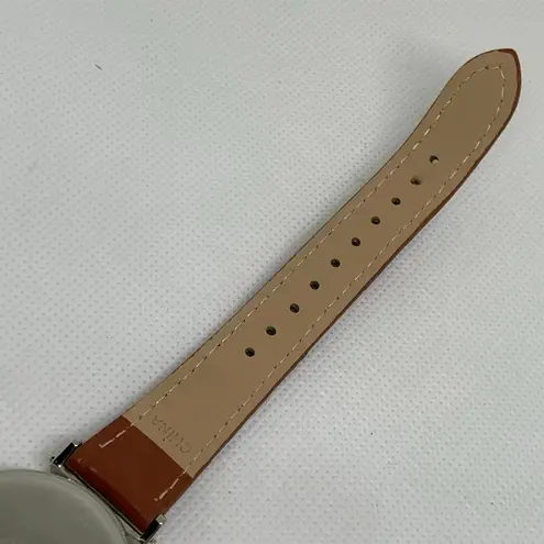 Geoffrey Beene Diamond women watch date 33mm round silver tone brown running