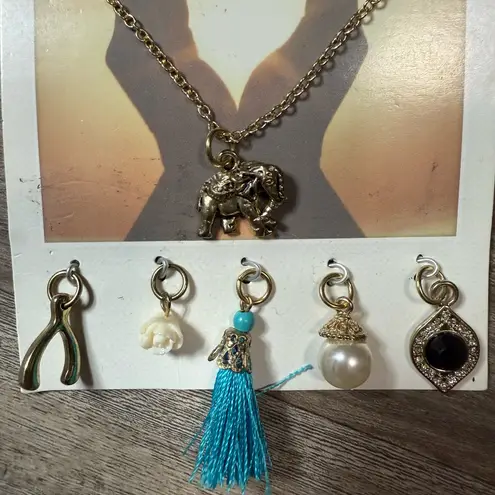 Charming assortment of 6 pieces, including a blue tassel, elephant, and more Gold