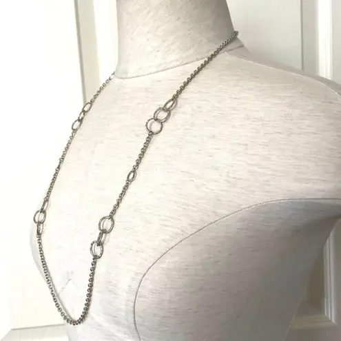 Long silver tone necklace with circles