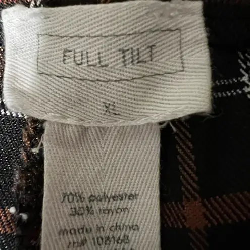 Full Tilt  cute fall look black slacks with orangish tan and white plaid.