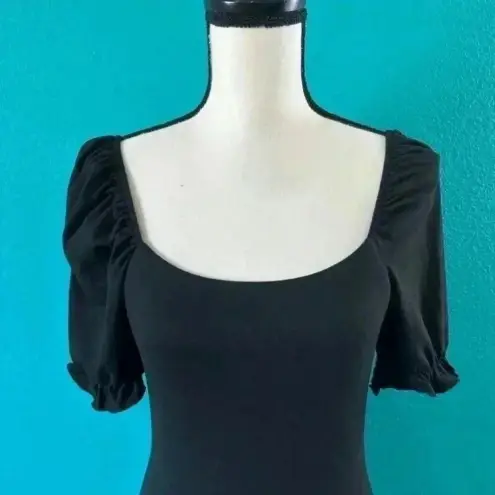 Pink Lily  black puff sleeve bodysuit in size small